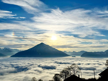 Scenic view of snowcapped mountains against sky