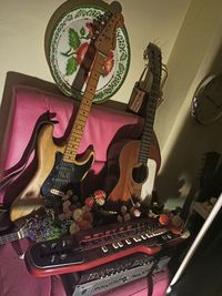 High angle view of guitar at home