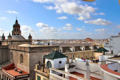 View of buildings in city against sky