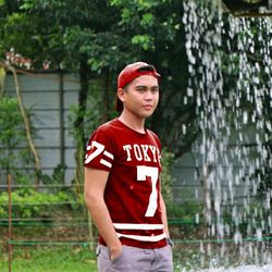 Young man standing outdoors