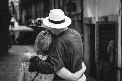 Rear view of woman wearing hat