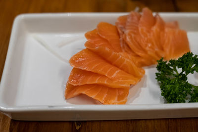 Close-up of fish served in plate on table