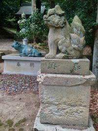 Buddha statue in cemetery