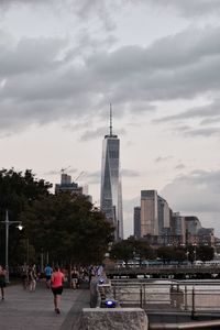 City skyline against cloudy sky