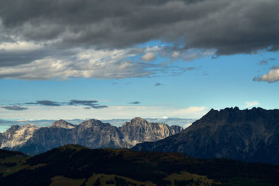 View of mountain range against cloudy sky