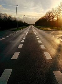 Empty road at sunset