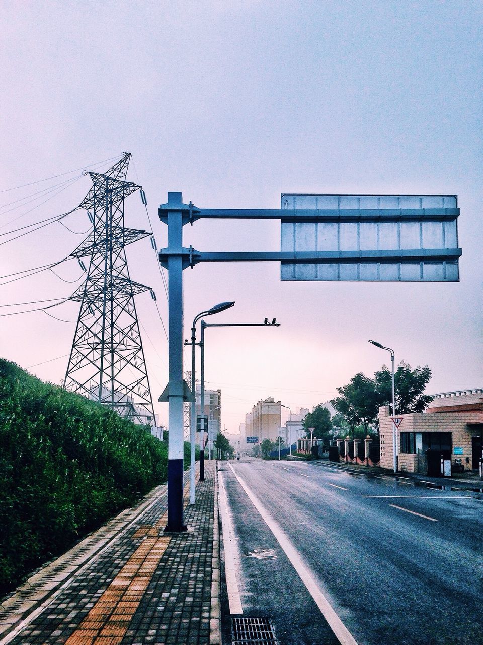 the way forward, clear sky, building exterior, built structure, architecture, electricity pylon, power line, road, transportation, electricity, street, cable, diminishing perspective, copy space, fuel and power generation, street light, sky, power supply, connection, day