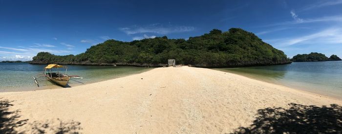 Scenic view of beach against sky