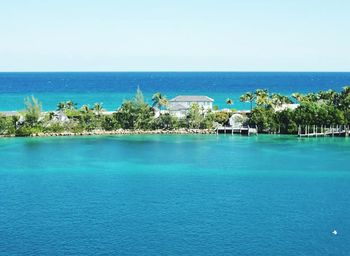 Scenic view of sea against blue sky