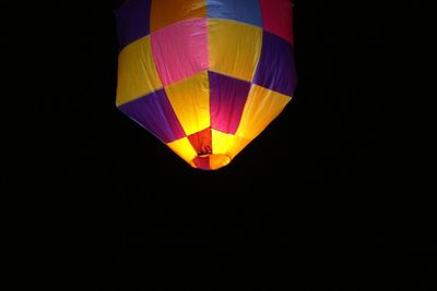 Low angle view of hot air balloon against sky at night