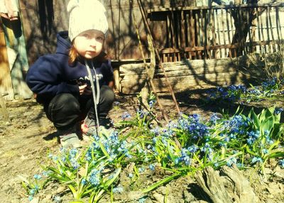 Portrait of boy on plants