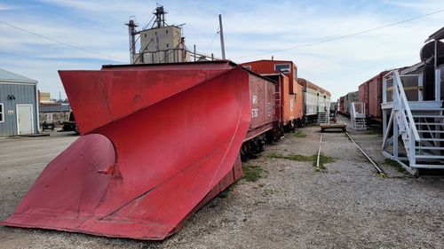 Train on railroad track against sky