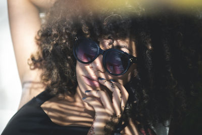 Young woman wearing sunglasses during sunny day