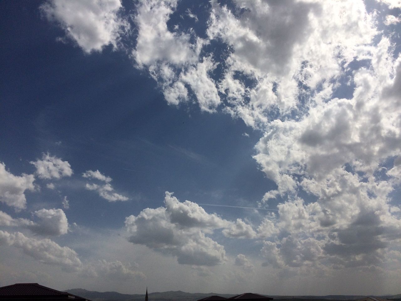 sky, cloud - sky, tranquil scene, tranquility, scenics, beauty in nature, cloudy, nature, cloud, blue, idyllic, cloudscape, low angle view, sea, day, outdoors, no people, remote, non-urban scene, majestic