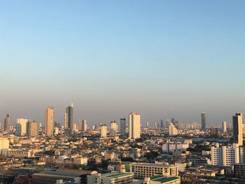 View of cityscape against clear sky