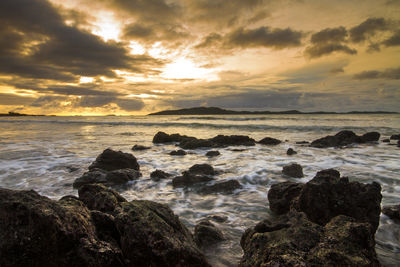 Scenic view of sea against sky during sunset