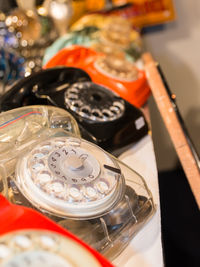 High angle view of landline phones on table