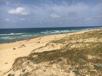 Scenic view of beach against sky