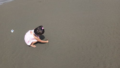High angle view of kid on beach
