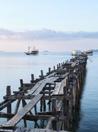 Pier over sea against sky