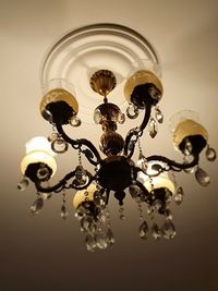 Low angle view of illuminated chandelier