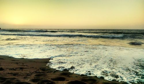 Scenic view of sea at sunset