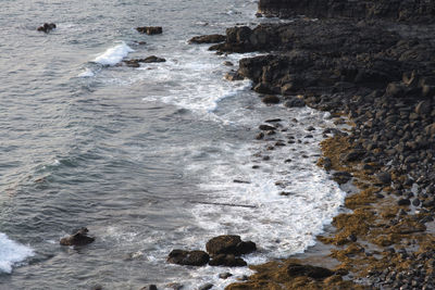 Scenic view of rocks in sea