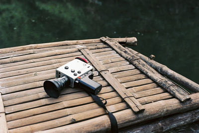 Close-up of wooden plank against sky