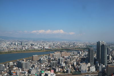 Aerial view of cityscape against clear sky