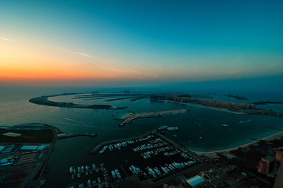 High angle view of sea against sky during sunset