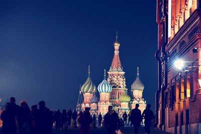 Group of people in front of saint basil's  at night