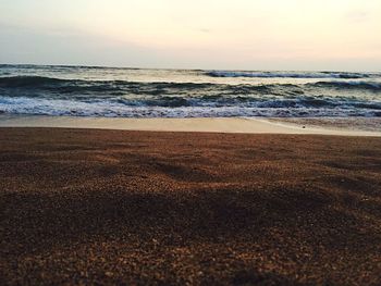 Scenic view of sea at sunset