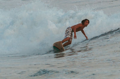 Man surfing on beach