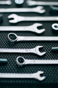 Set of chrome wrenches on steel surface. mechanic tools for maintenance. hardware tools to fix. tech