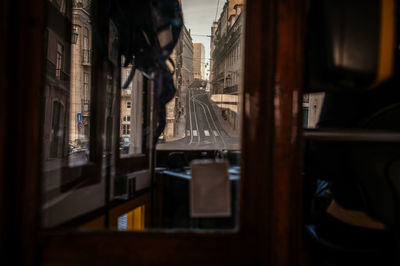 Buildings seen through glass window at home