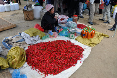 People at market stall