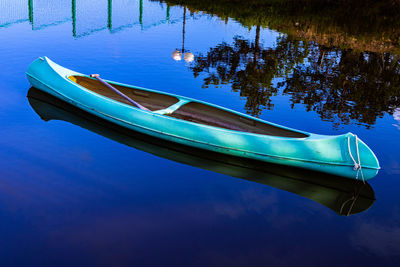 Old canoe on a lake.