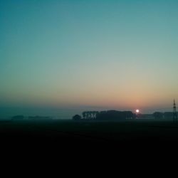 Scenic view of landscape at sunset