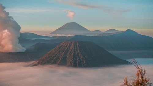 Scenic view of mountains against sky during sunset