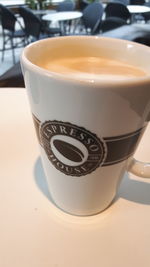 Close-up of coffee cup on table