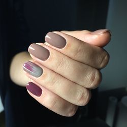 Close-up of woman hand holding eyeglasses