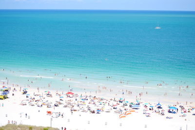 Scenic view of beach on sunny day