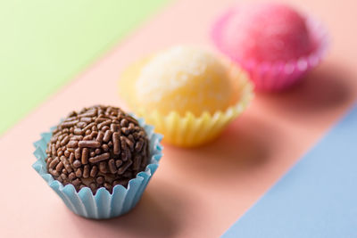 Close-up of colorful cupcakes on table