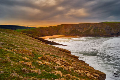 Scenic view of sea against sky during sunset