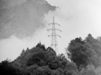 Low angle view of electricity pylon