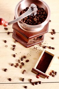 Close-up of coffee grinder on table 