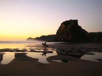 Scenic view of sea at sunset