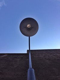 Low angle view of pole against clear sky