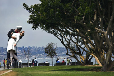 People in park against sky