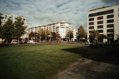 Buildings in city against sky